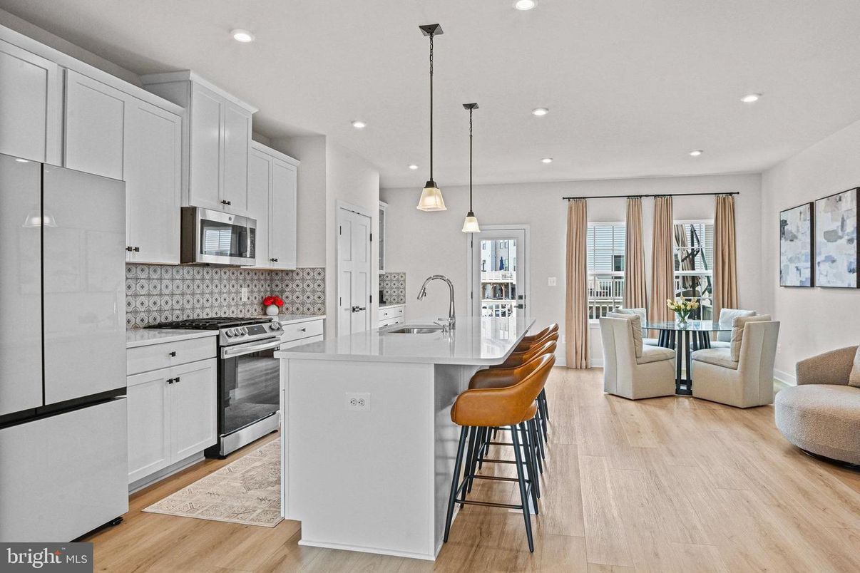 Dining room, Interior, Kitchen, Pendant Lights, Recessed Lighting, Stainless Steel Appliances, Wood Texture Flooring