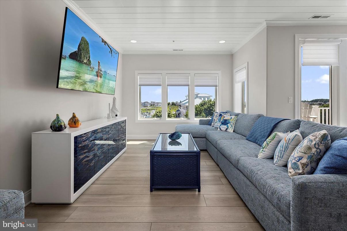 Fireplace, Interior, Living room, Recessed Lighting, Water, Wood Texture Flooring