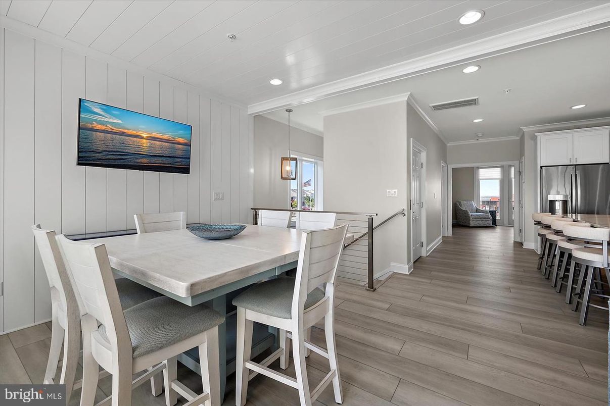 Dining room, Interior, Pendant Lights, Recessed Lighting, Stainless Steel Appliances, Wood Texture Flooring