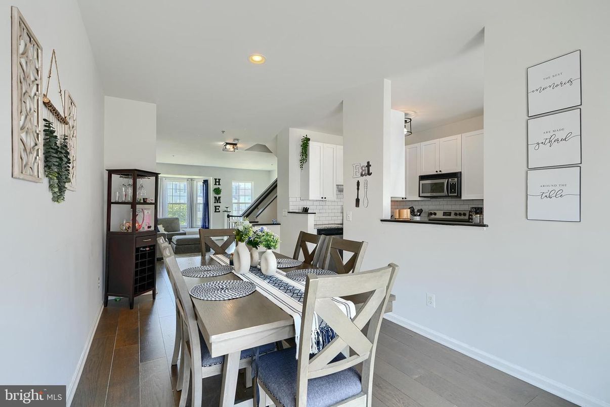 Dining room, Interior, Kitchen, Recessed Lighting, Stainless Steel Appliances, Wood Texture Flooring