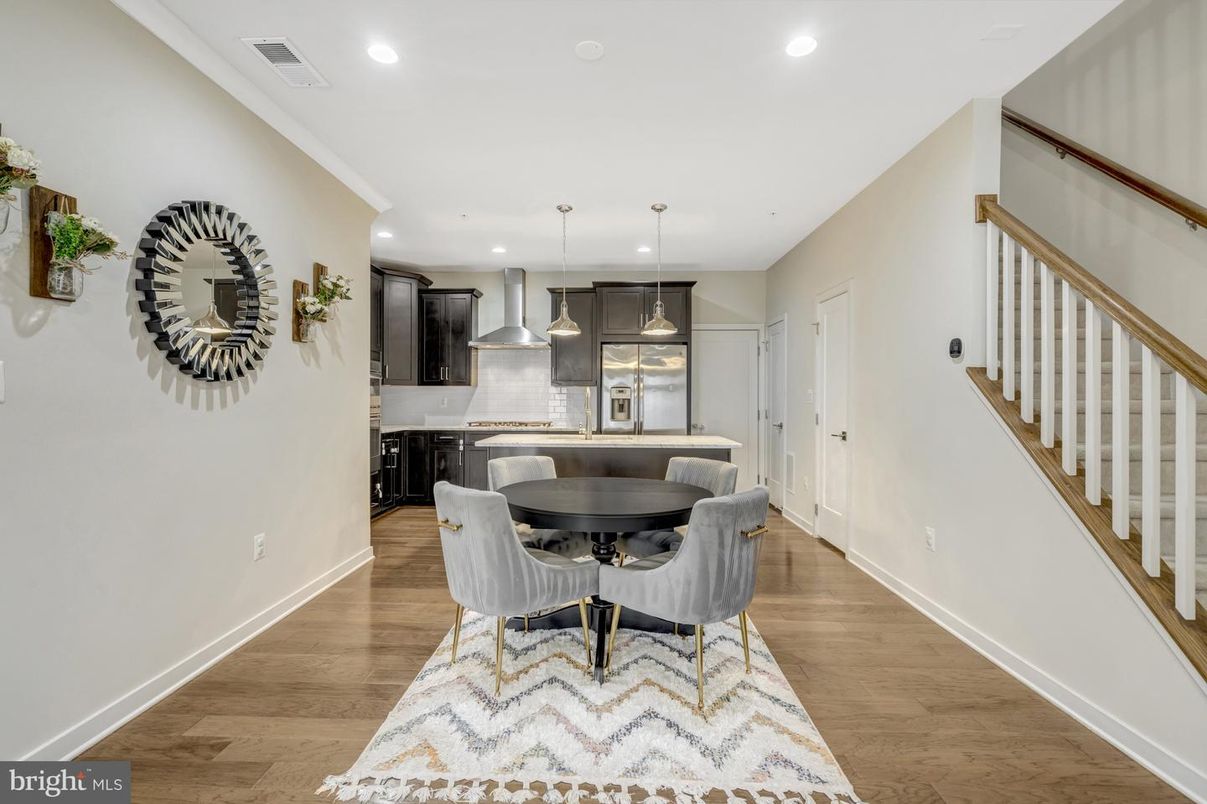 Dining room, Interior, Kitchen, Pendant Lights, Recessed Lighting, Stainless Steel Appliances, Wood Texture Flooring