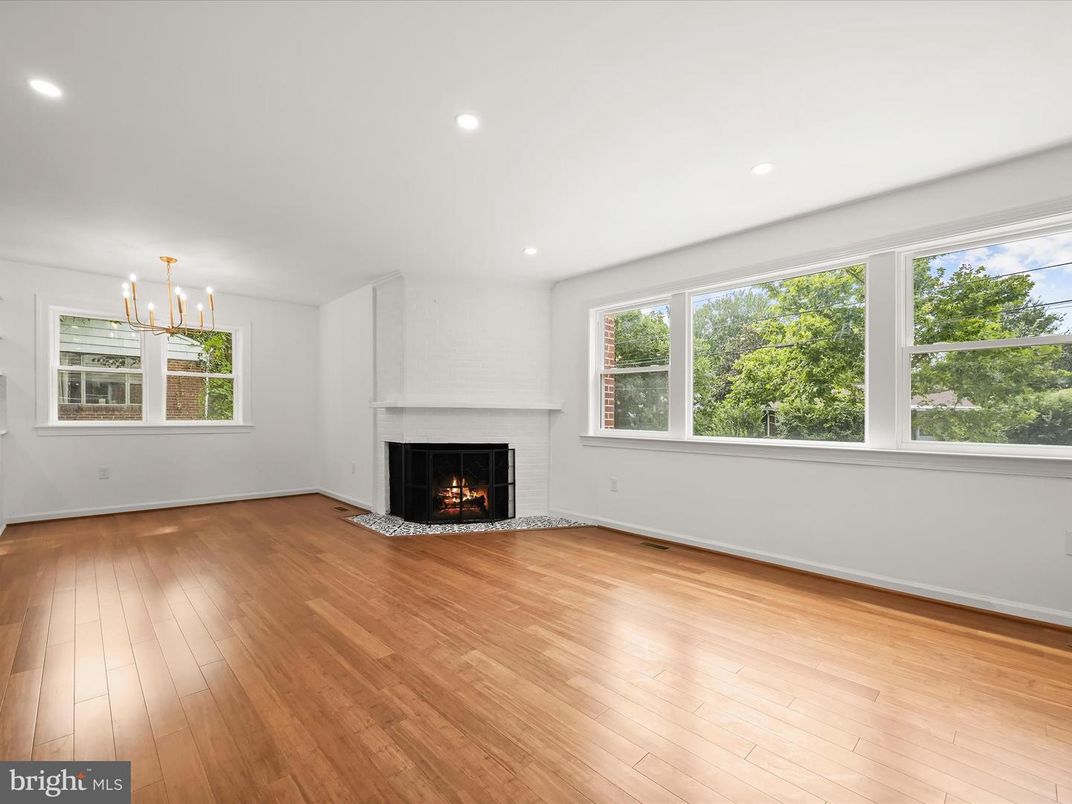 Chandelier, Empty room, Fireplace, Interior, Recessed Lighting, Wood Texture Flooring