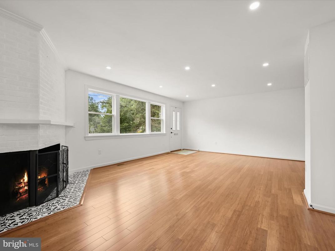 Empty room, Fireplace, Interior, Recessed Lighting, Wood Texture Flooring