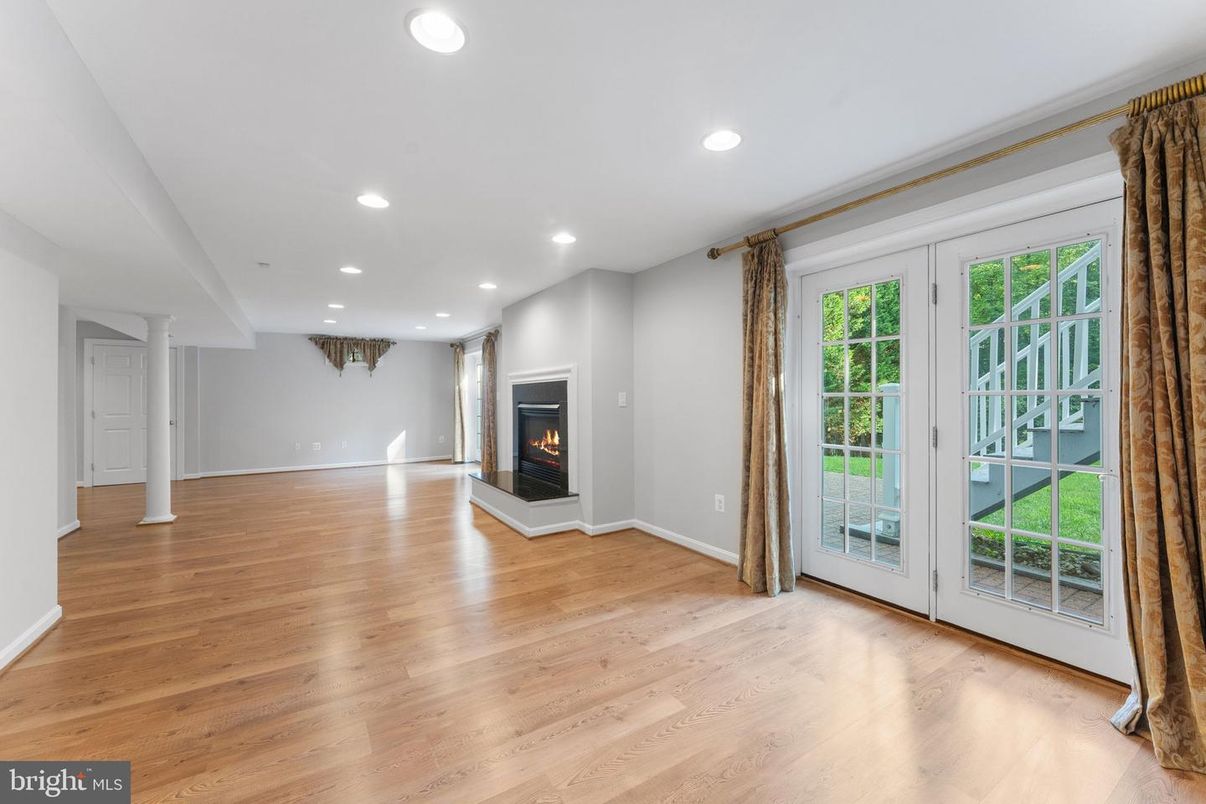 Empty room, Fireplace, Interior, Recessed Lighting, Wood Texture Flooring