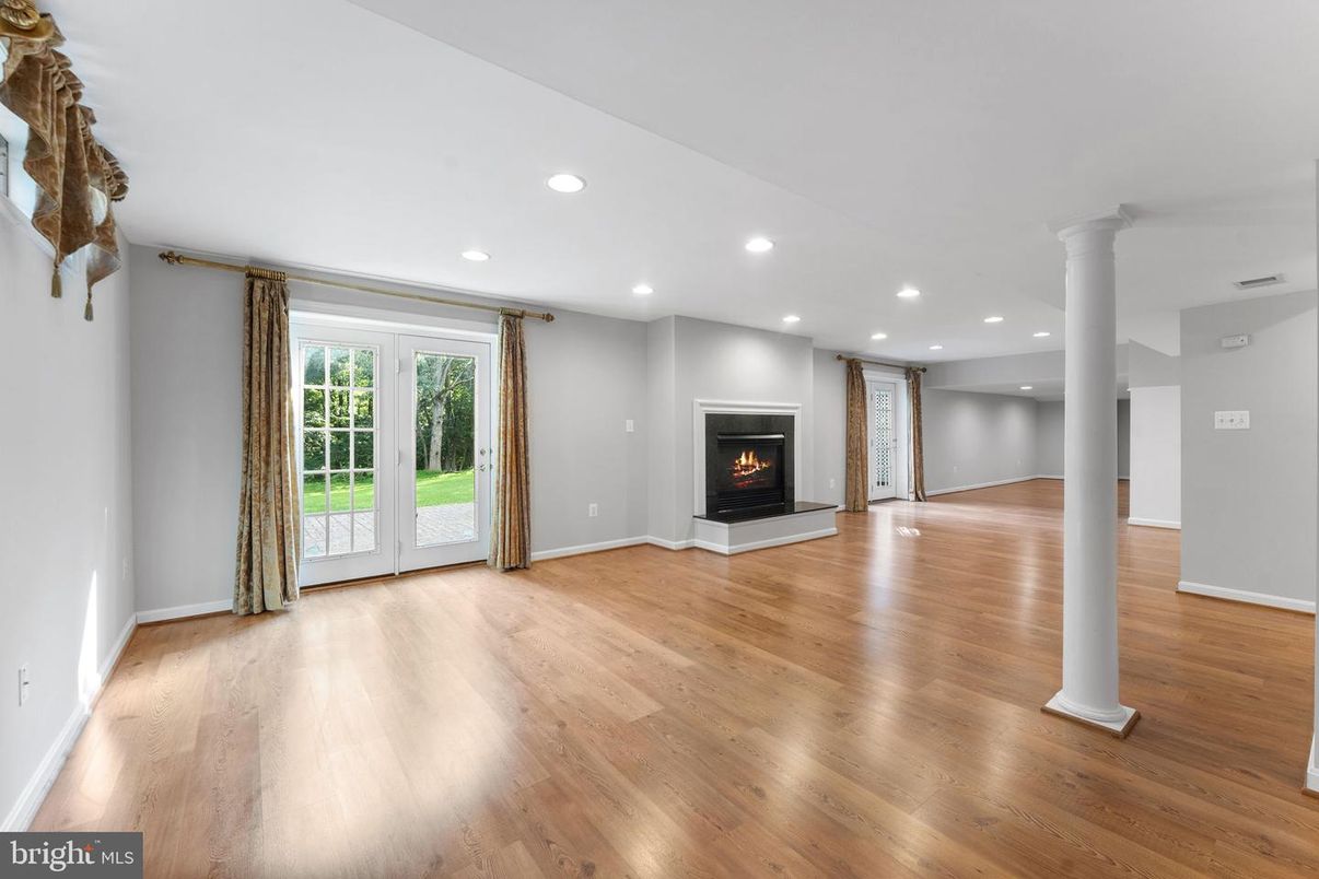 Empty room, Fireplace, Interior, Recessed Lighting, Wood Texture Flooring