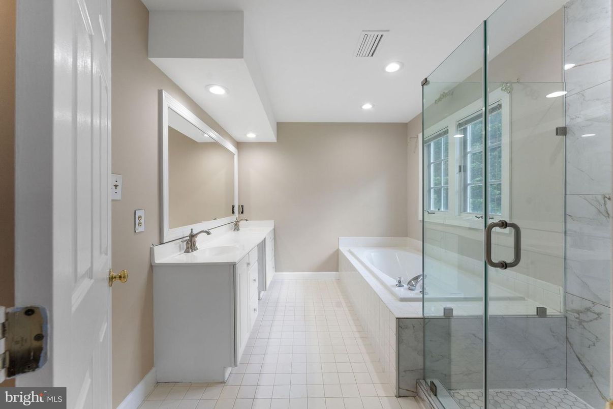 Bathroom, Dual Sink Vanities, Glass Shower, Interior, Marble Walls, Recessed Lighting