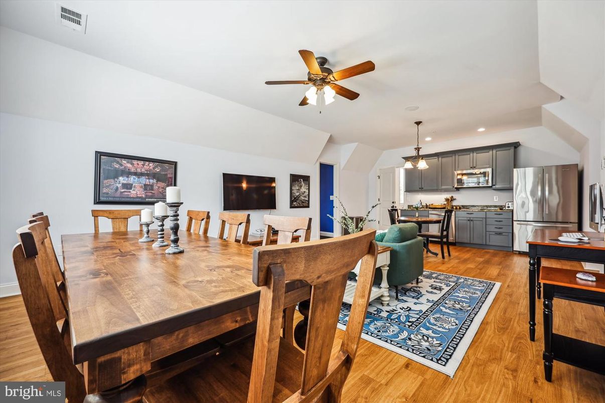 Dining room, Interior, Kitchen, Pendant Lights, Recessed Lighting, Stainless Steel Appliances, Wood Texture Flooring
