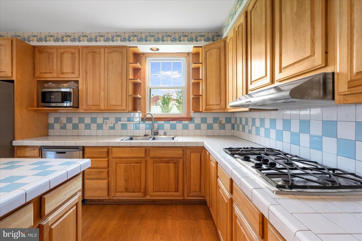 Interior, Kitchen, Tile Countertops, Wood Texture Flooring