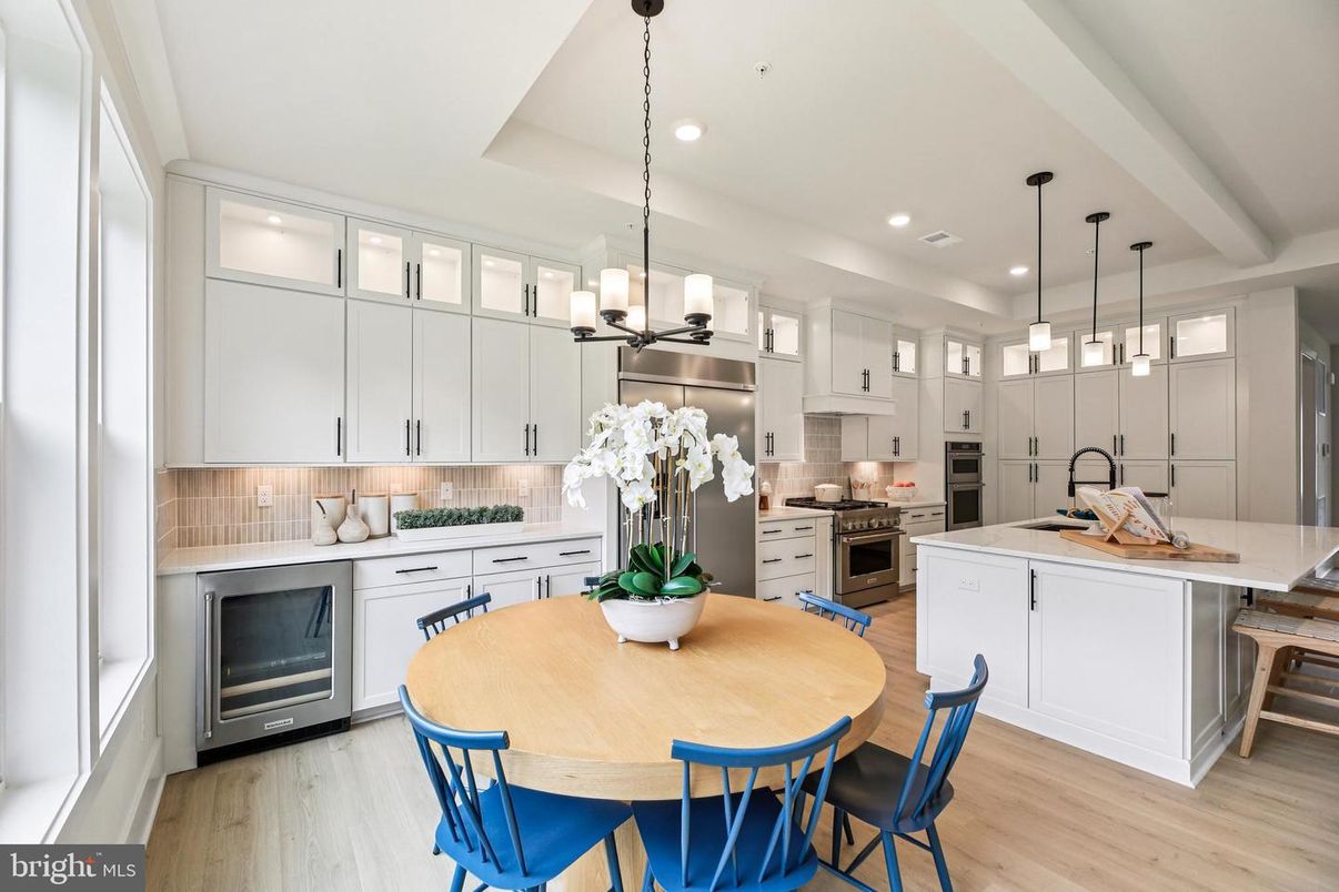 Chandelier, Dining room, Interior, Kitchen, Pendant Lights, Recessed Lighting, Stainless Steel Appliances, Wood Texture Flooring