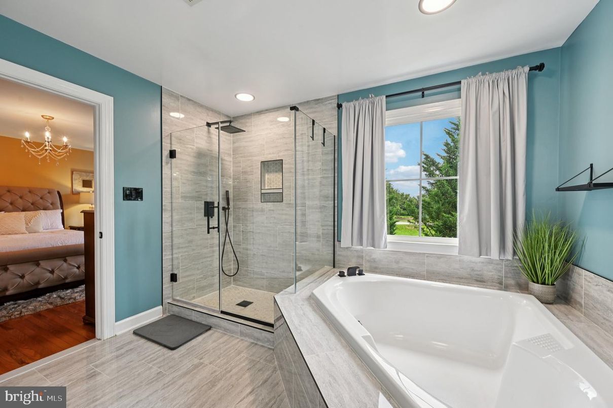 Bathroom, Chandelier, Glass Shower, Interior, Recessed Lighting, Wood Texture Flooring