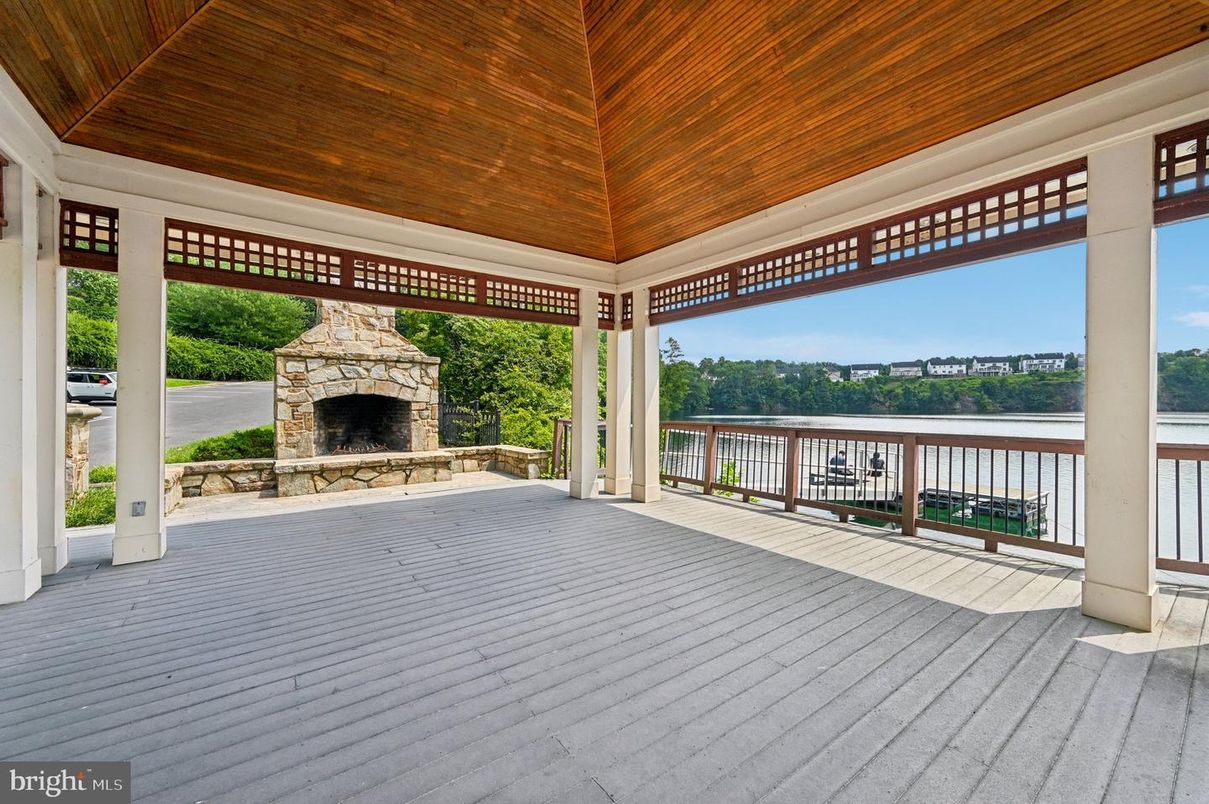 Exterior, Fireplace, Water, Wooden Ceilings
