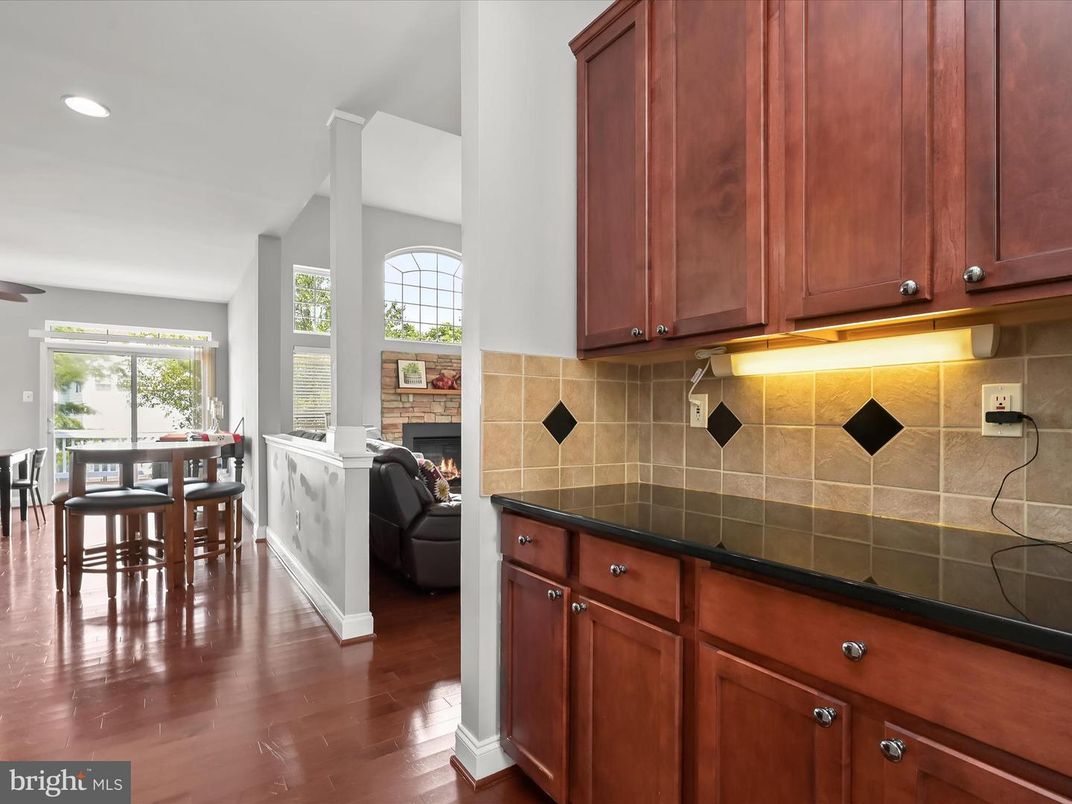 Dining room, Fireplace, Interior, Recessed Lighting, Wood Texture Flooring