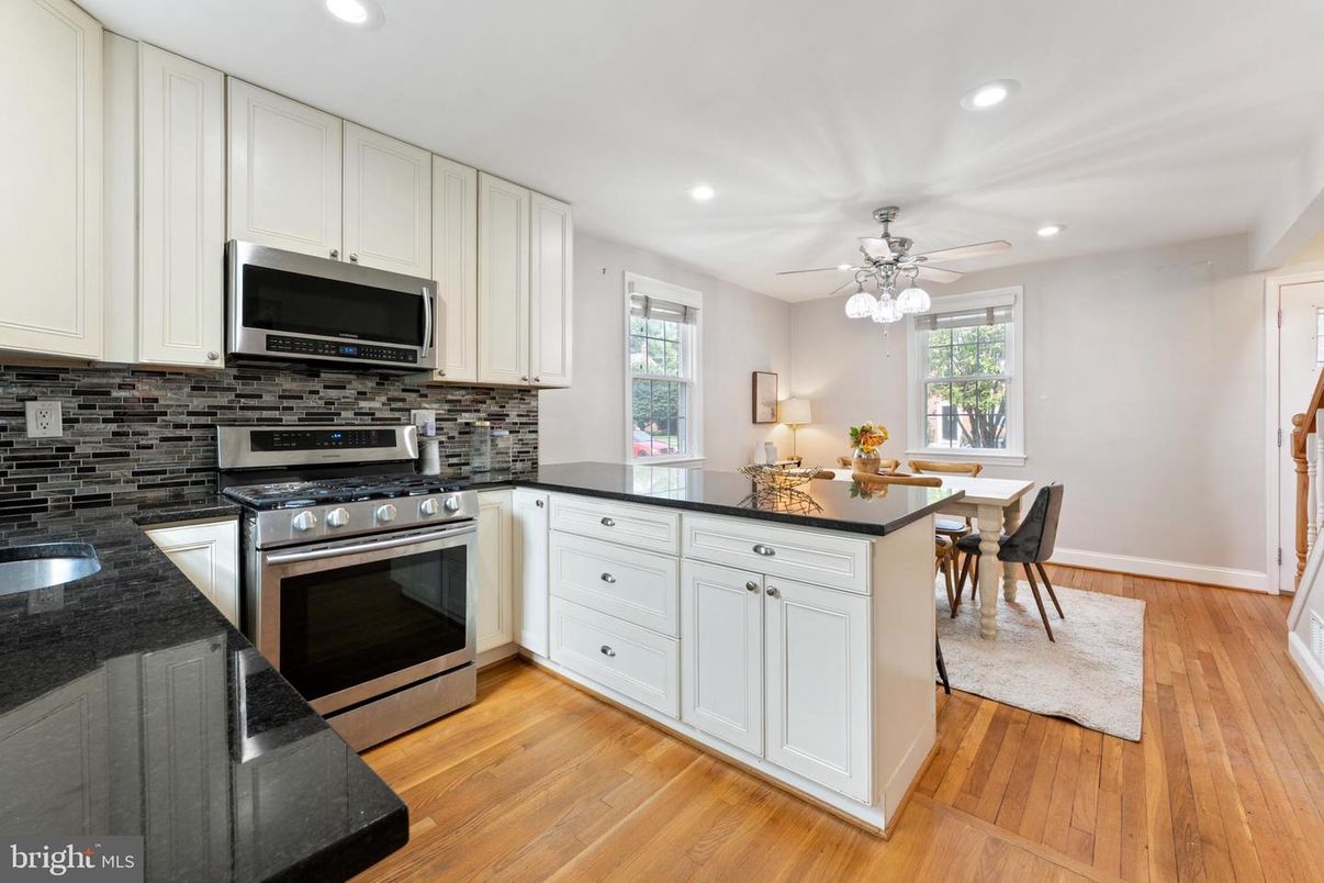 Dining room, Interior, Kitchen, Recessed Lighting, Stainless Steel Appliances, Wood Texture Flooring