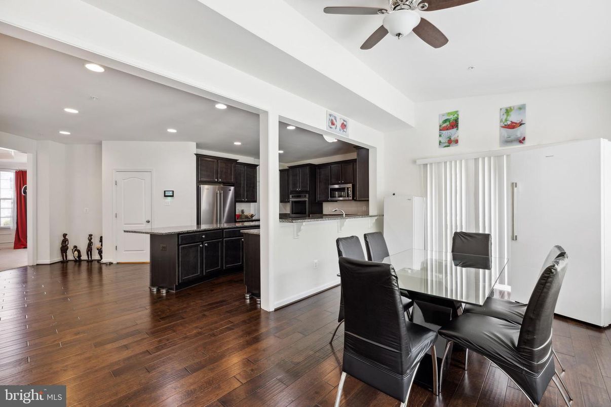 Dining room, Interior, Kitchen, Recessed Lighting, Stainless Steel Appliances, Wood Texture Flooring
