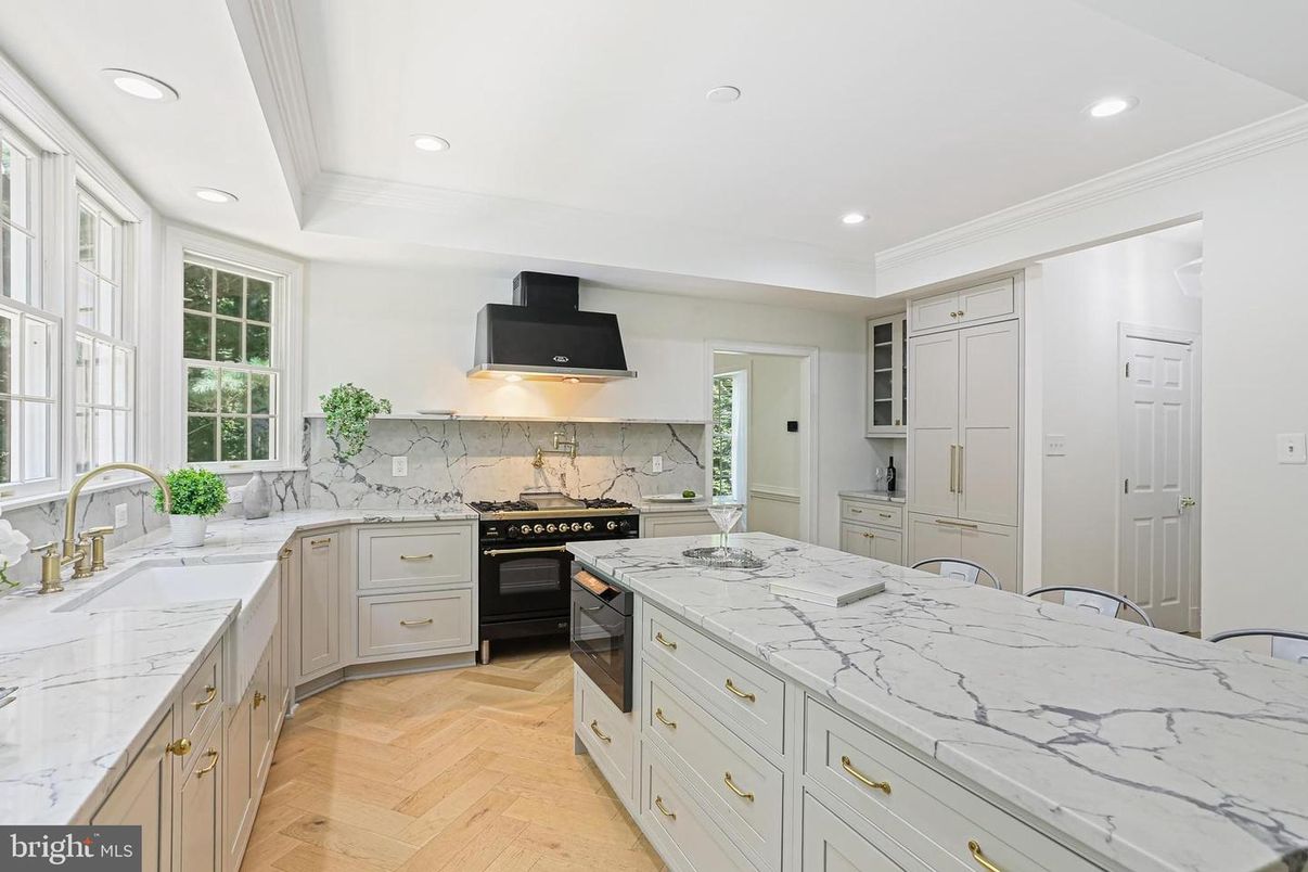 Interior, Kitchen, Marble Walls, Recessed Lighting, Stainless Steel Appliances, Wood Texture Flooring