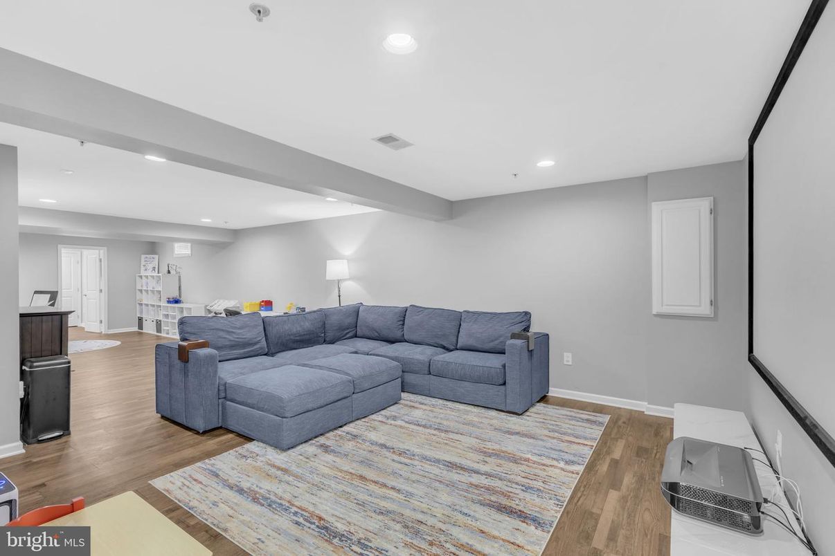 Interior, Living room, Projection Screen, Recessed Lighting, Wood Texture Flooring