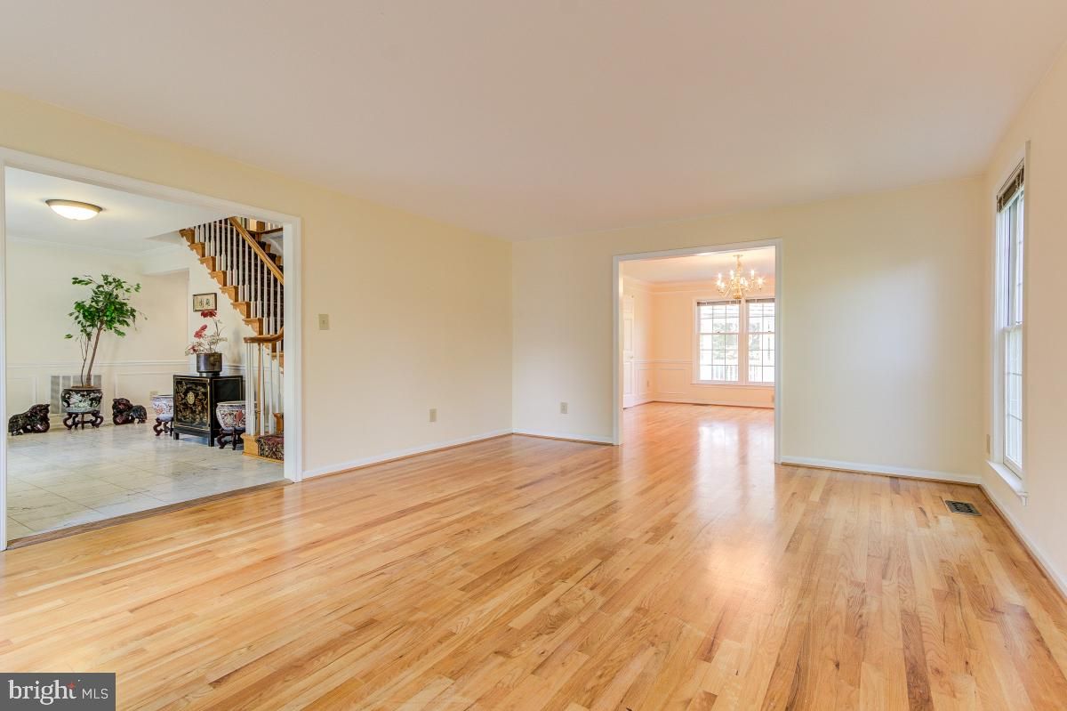 Chandelier, Empty room, Fireplace, Interior, Wood Texture Flooring