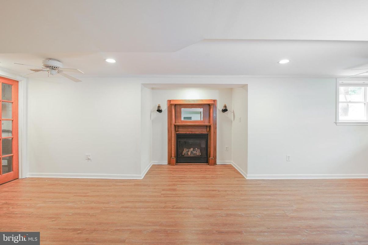 Empty room, Fireplace, Interior, Recessed Lighting, Wood Texture Flooring