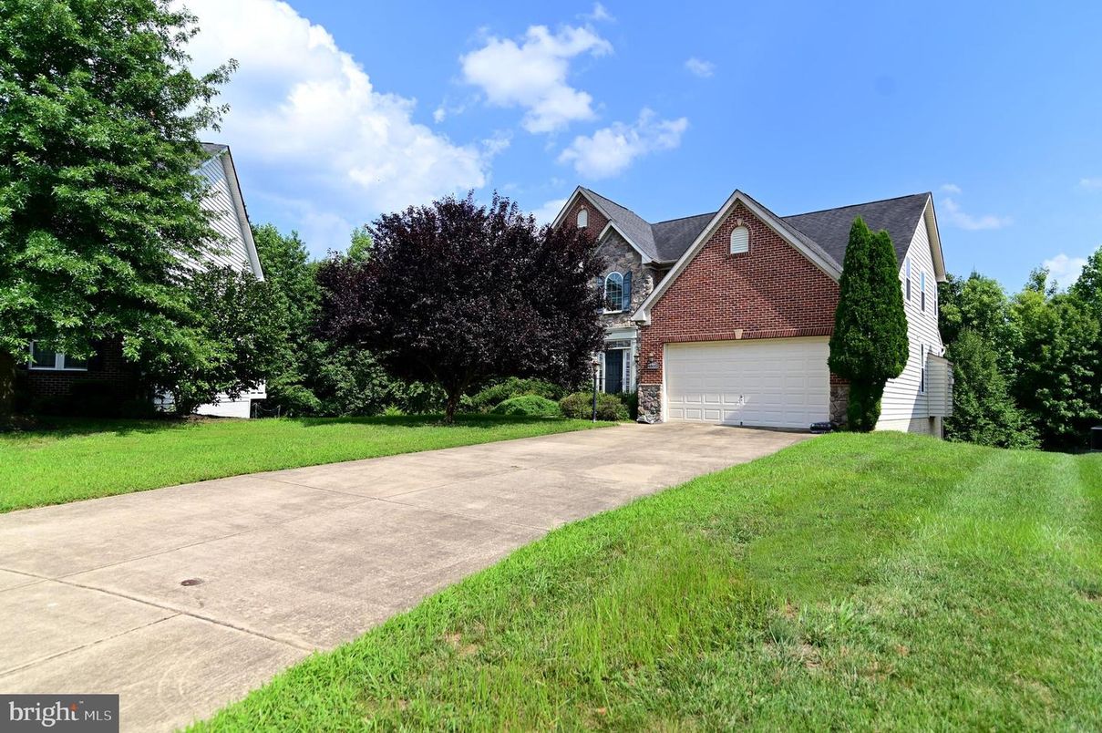 Attached, Exterior, Facade, Brick Facade, Tudor Revival