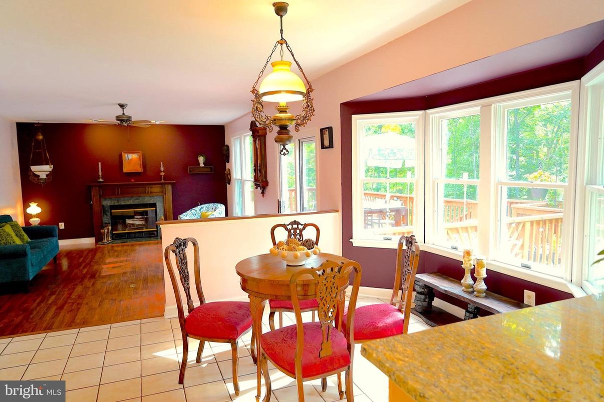 Dining room, Fireplace, Interior, Pendant Lights, Wood Texture Flooring