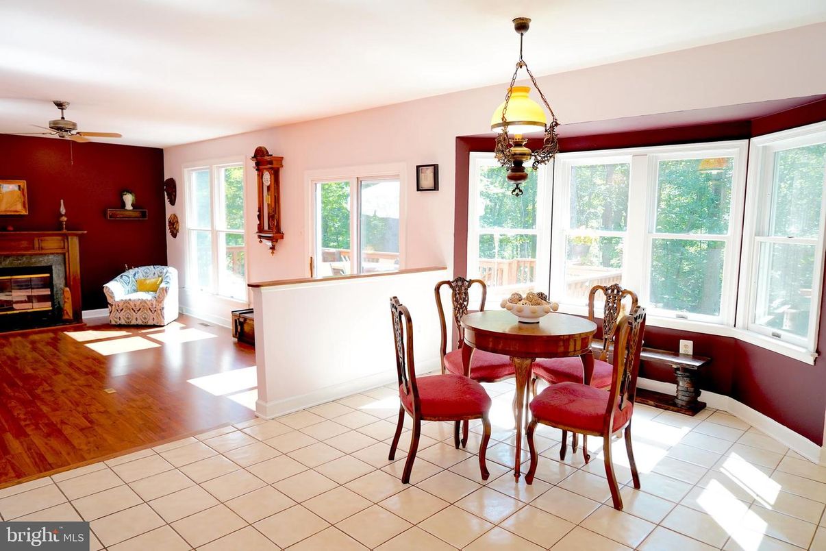 Dining room, Fireplace, Interior, Pendant Lights, Wood Texture Flooring