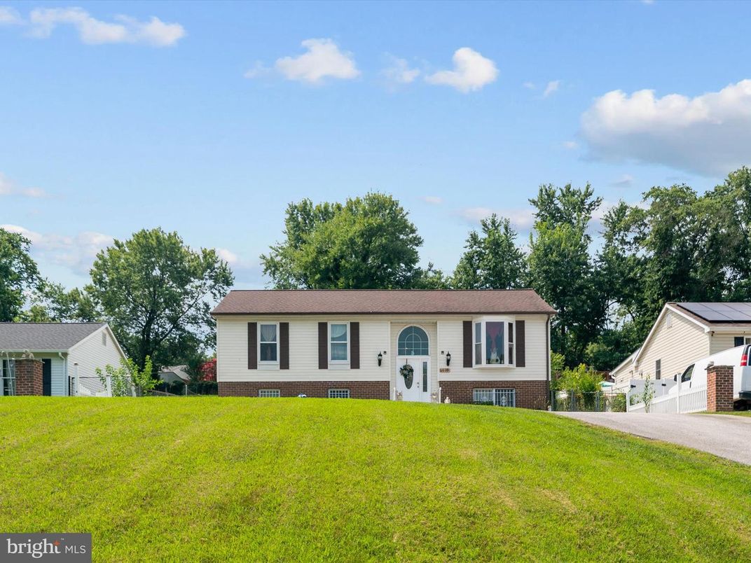 Backyard, Exterior, Facade, Solar Panels, Raised Ranch