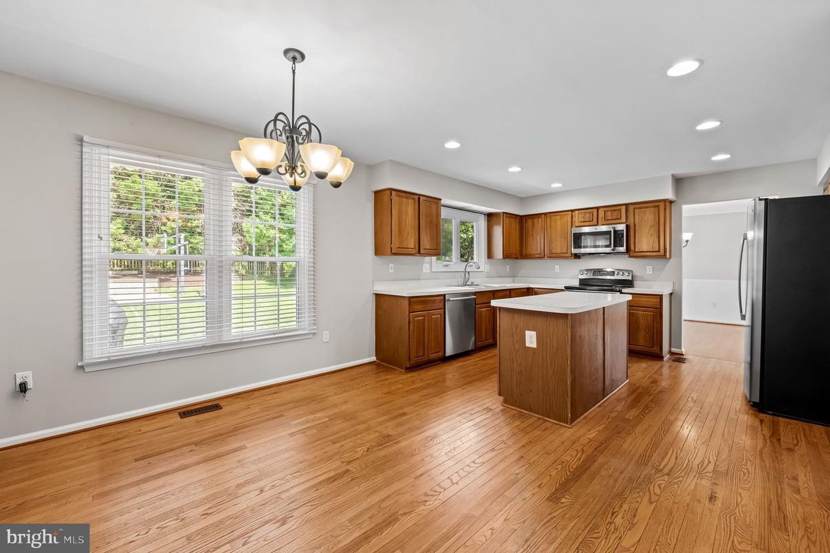 Chandelier, Interior, Kitchen, Recessed Lighting, Stainless Steel Appliances, Wood Texture Flooring