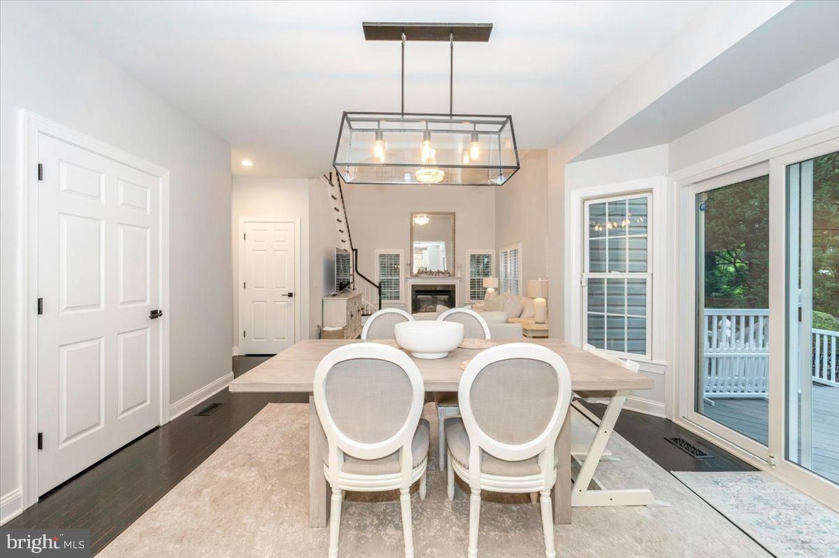Dining room, Fireplace, Interior, Pendant Lights, Recessed Lighting, Wood Texture Flooring