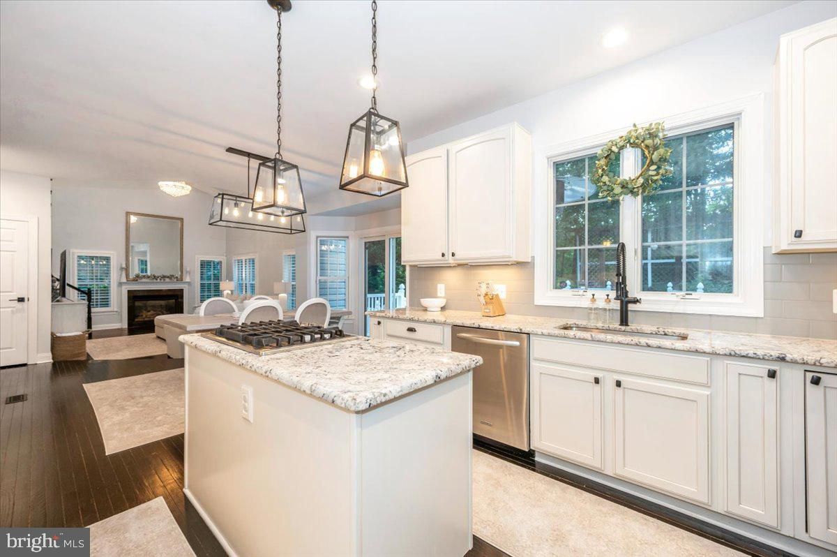 Fireplace, Interior, Kitchen, Pendant Lights, Recessed Lighting, Stainless Steel Appliances, Wood Texture Flooring