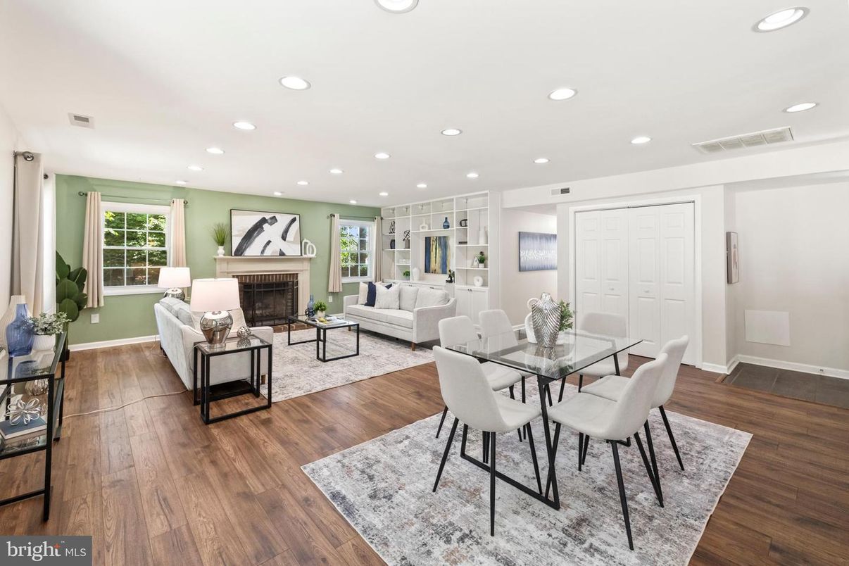 Dining room, Fireplace, Interior, Living room, Recessed Lighting, Wood Texture Flooring