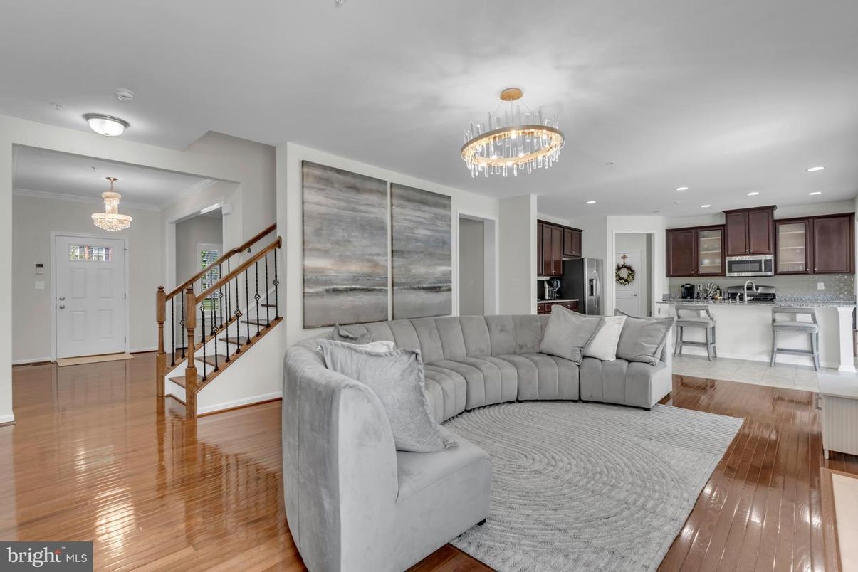 Chandelier, Interior, Kitchen, Living room, Recessed Lighting, Stainless Steel Appliances, Wood Texture Flooring