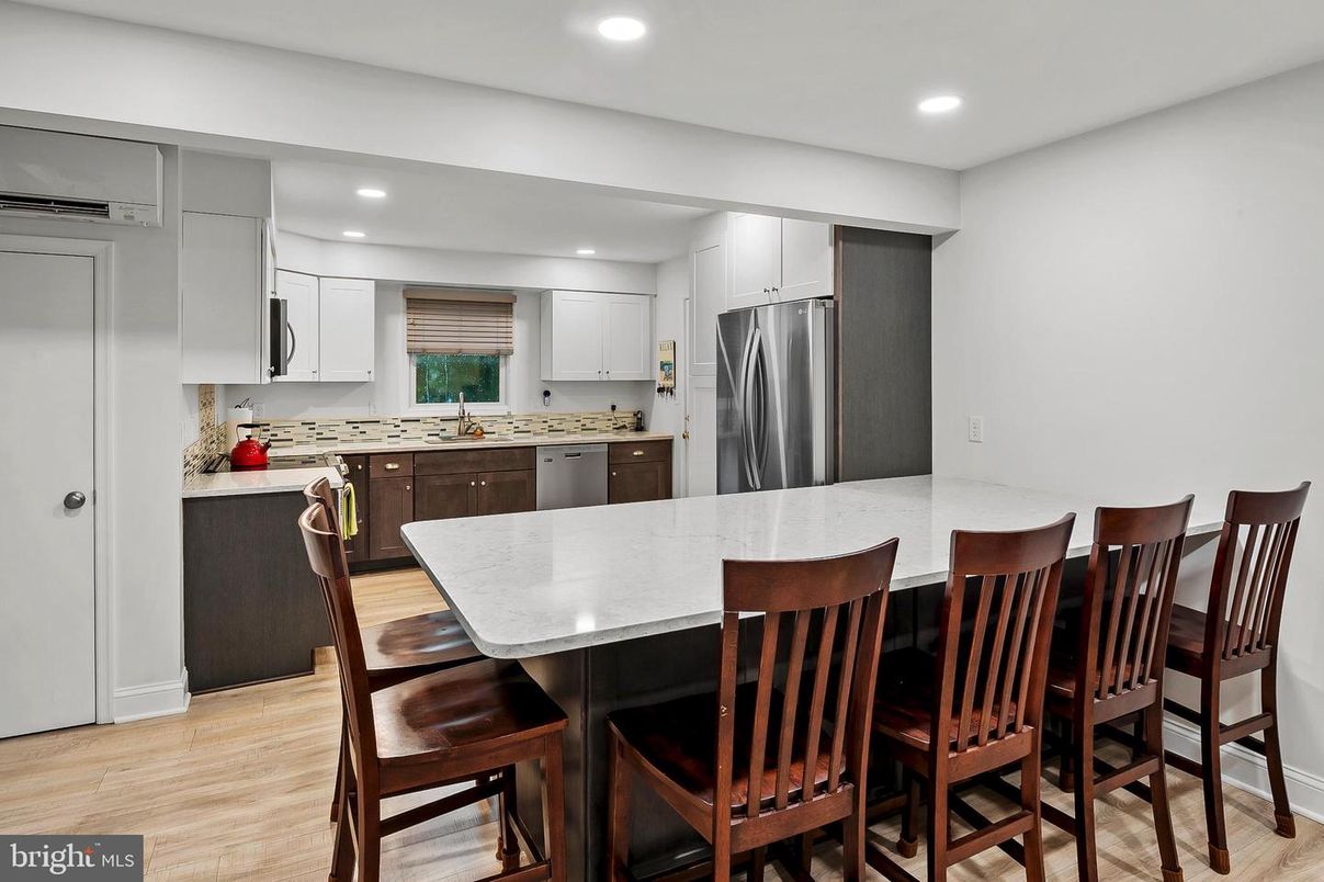 Dining room, Interior, Kitchen, Recessed Lighting, Stainless Steel Appliances, Wood Texture Flooring