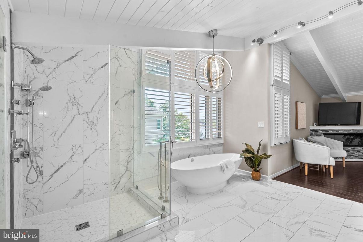 Bathroom, Free Standing Baths, Glass Shower, Interior, Marble, Marble Walls, Pendant Lights, Wood Texture Flooring