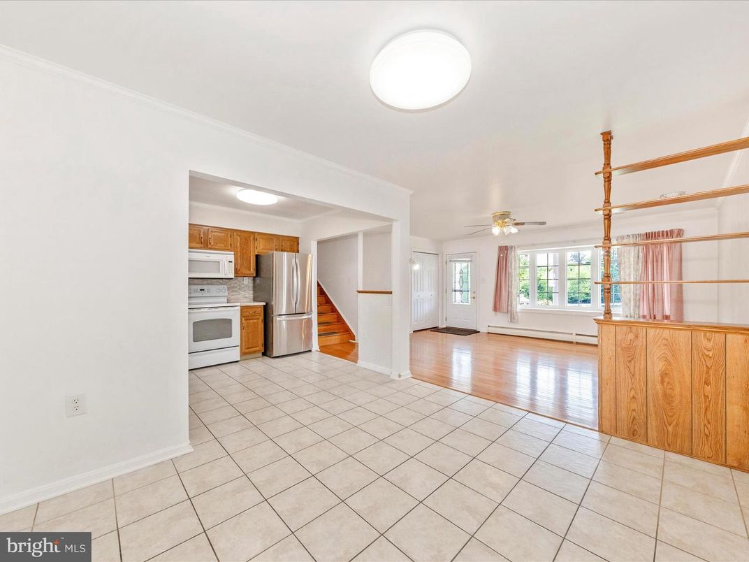 Empty room, Interior, Kitchen, Stainless Steel Appliances, Wood Texture Flooring
