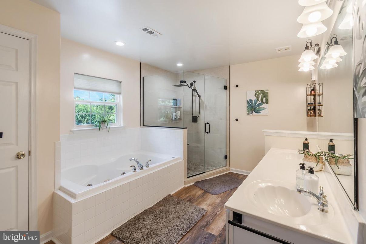 Bathroom, Dual Sink Vanities, Glass Shower, Interior, Recessed Lighting, Wood Texture Flooring