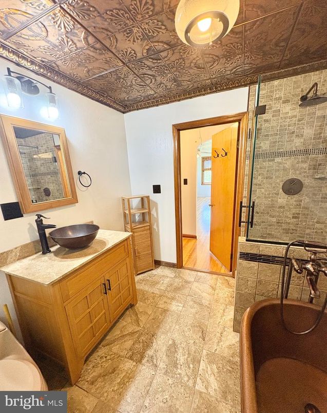 Bathroom, Dual Sink Vanities, Glass Shower, Interior, Wood Texture Flooring