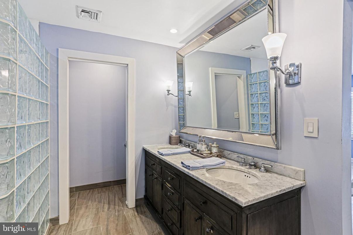 Bathroom, Dual Sink Vanities, Interior, Recessed Lighting, Wood Texture Flooring