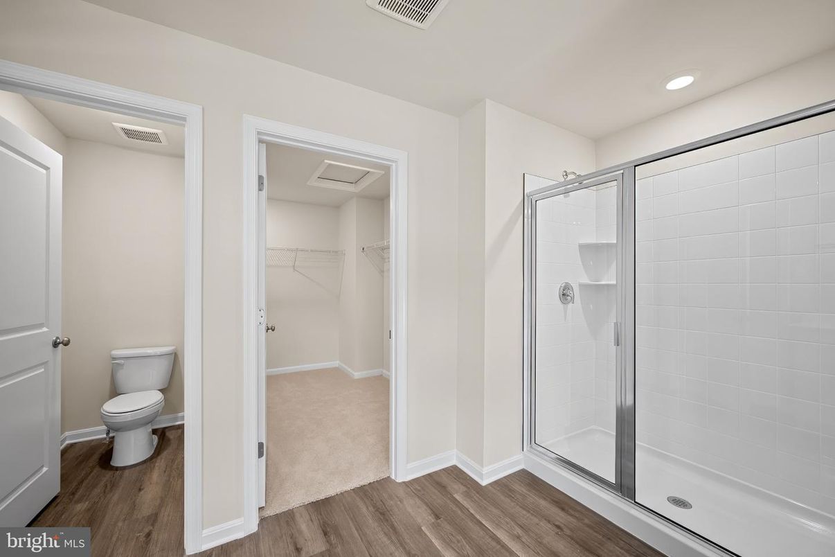 Bathroom, Glass Shower, Interior, Recessed Lighting, Walk-in Closets, Wood Texture Flooring
