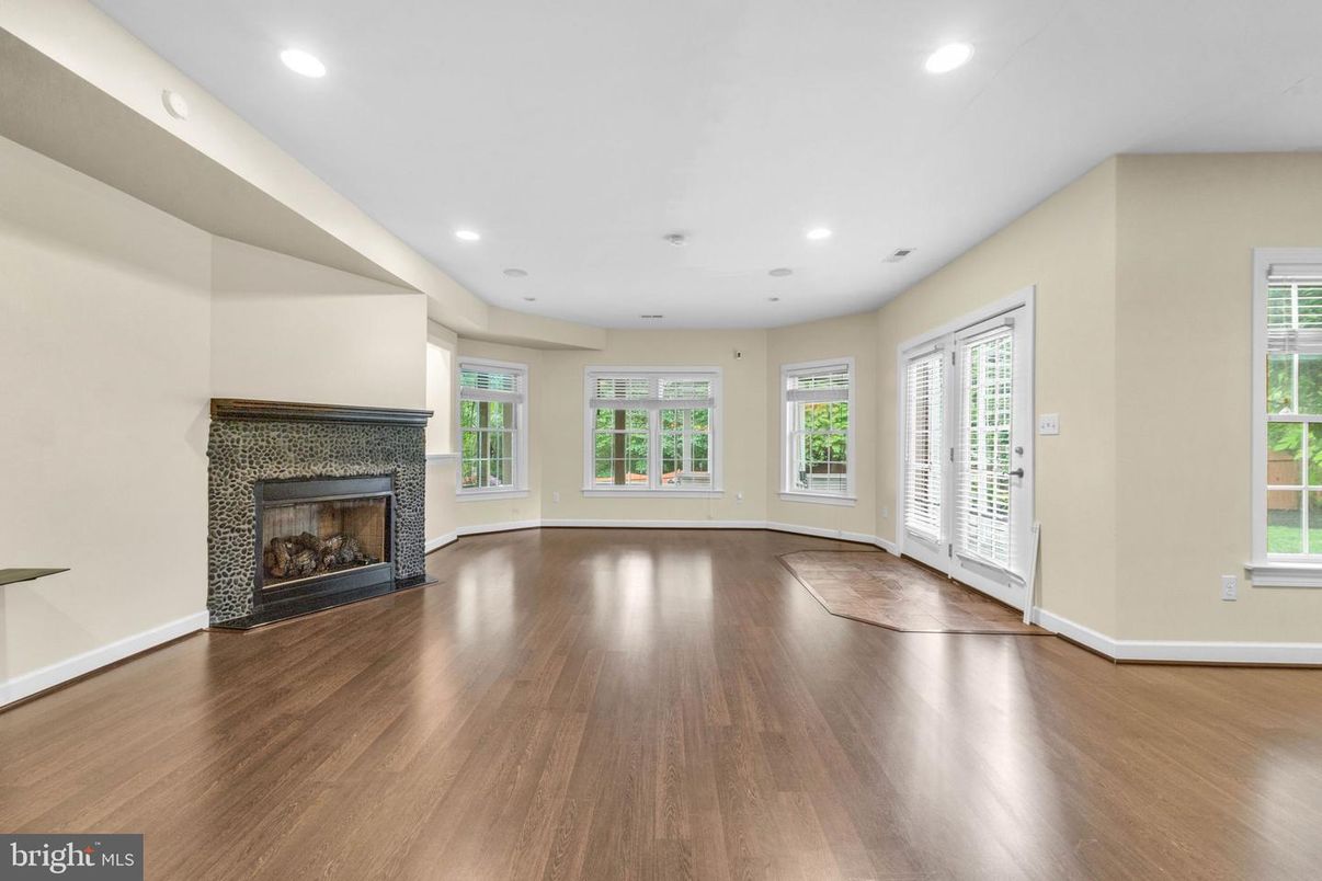 Empty room, Fireplace, Interior, Recessed Lighting, Wood Texture Flooring
