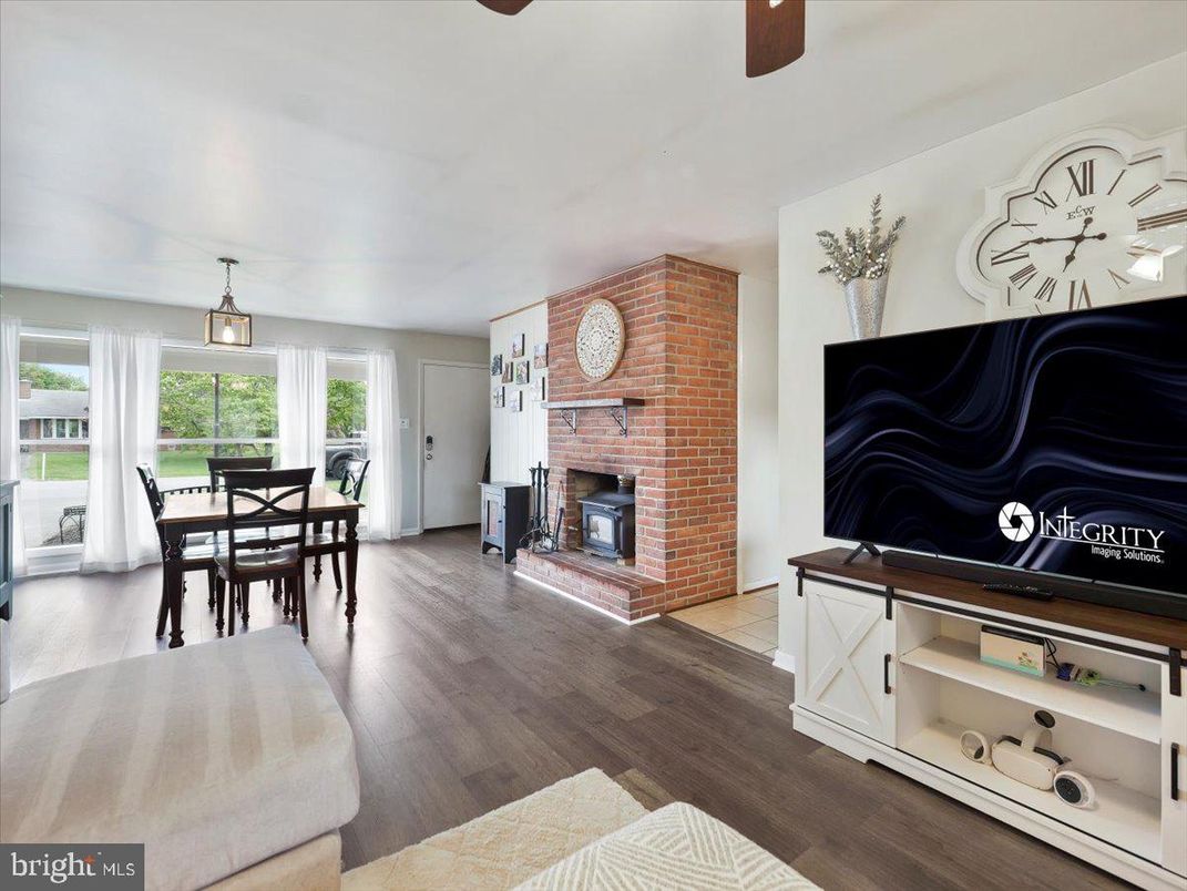 Dining room, Fireplace, Interior, Pendant Lights, Stone Walls, Wood Texture Flooring