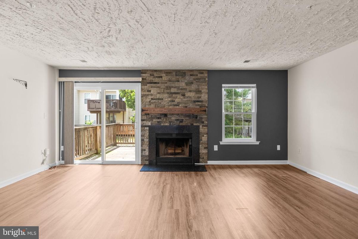 Empty room, Fireplace, Interior, Stone Walls, Wood Texture Flooring