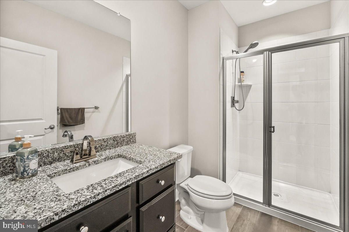 Bathroom, Glass Shower, Interior, Recessed Lighting, Wood Texture Flooring