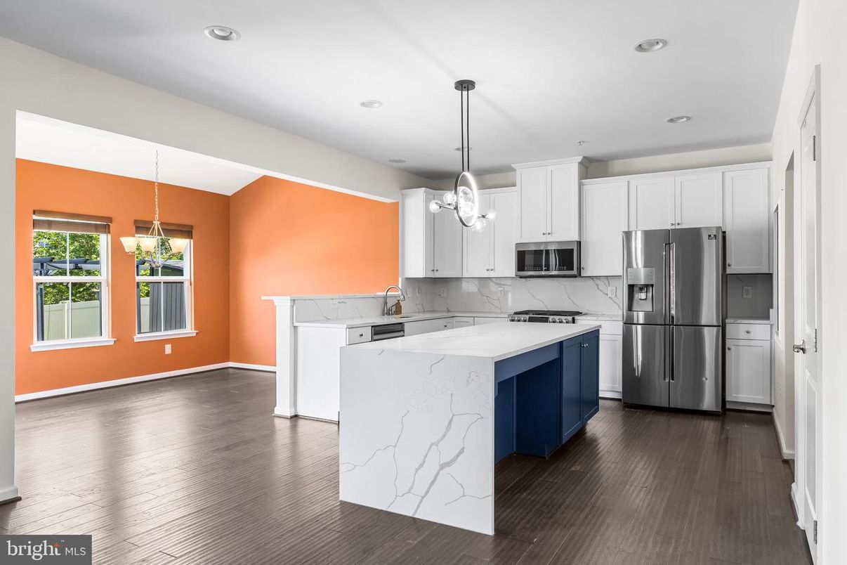 Interior, Kitchen, Marble Walls, Pendant Lights, Recessed Lighting, Stainless Steel Appliances, Wood Texture Flooring
