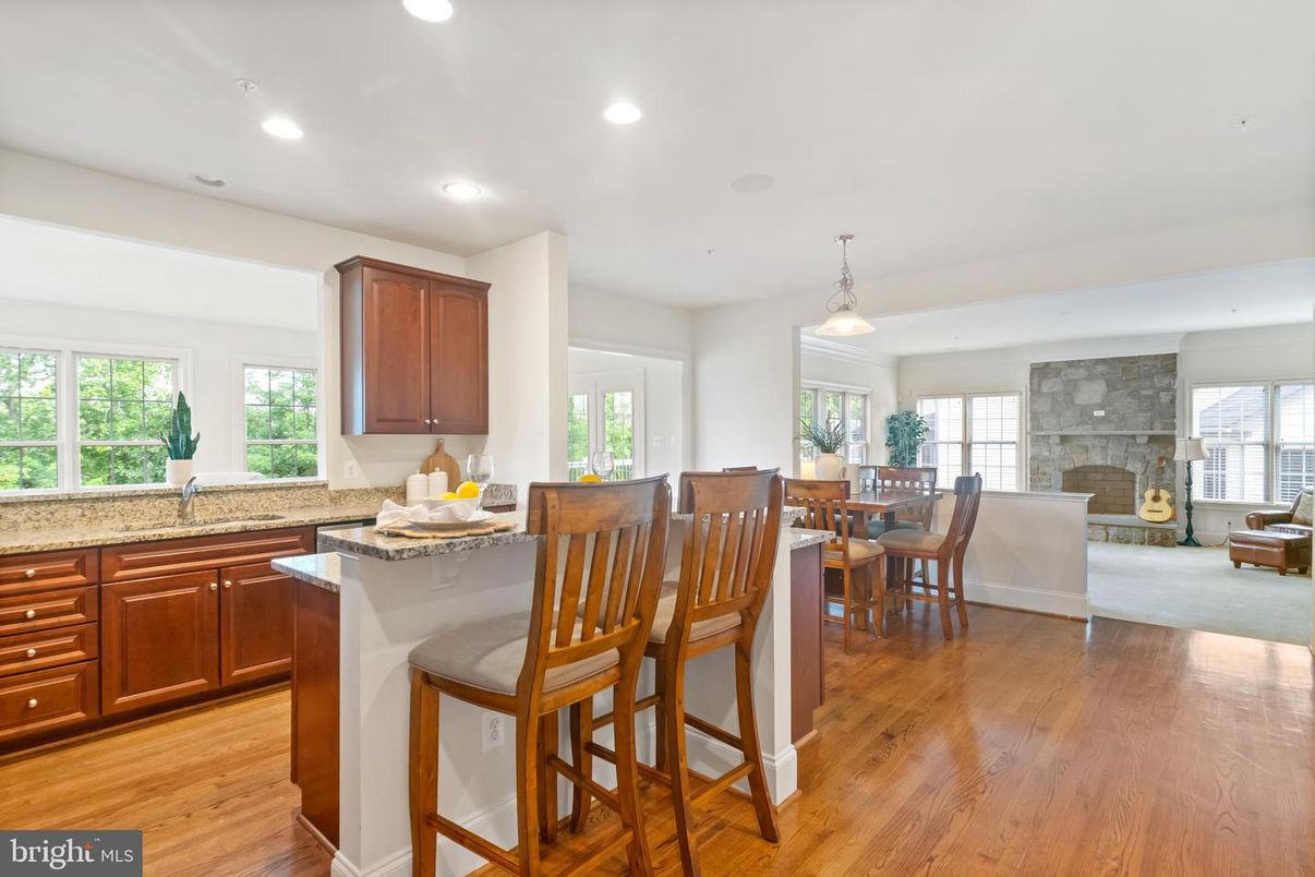 Dining room, Fireplace, Interior, Kitchen, Pendant Lights, Recessed Lighting, Wood Texture Flooring