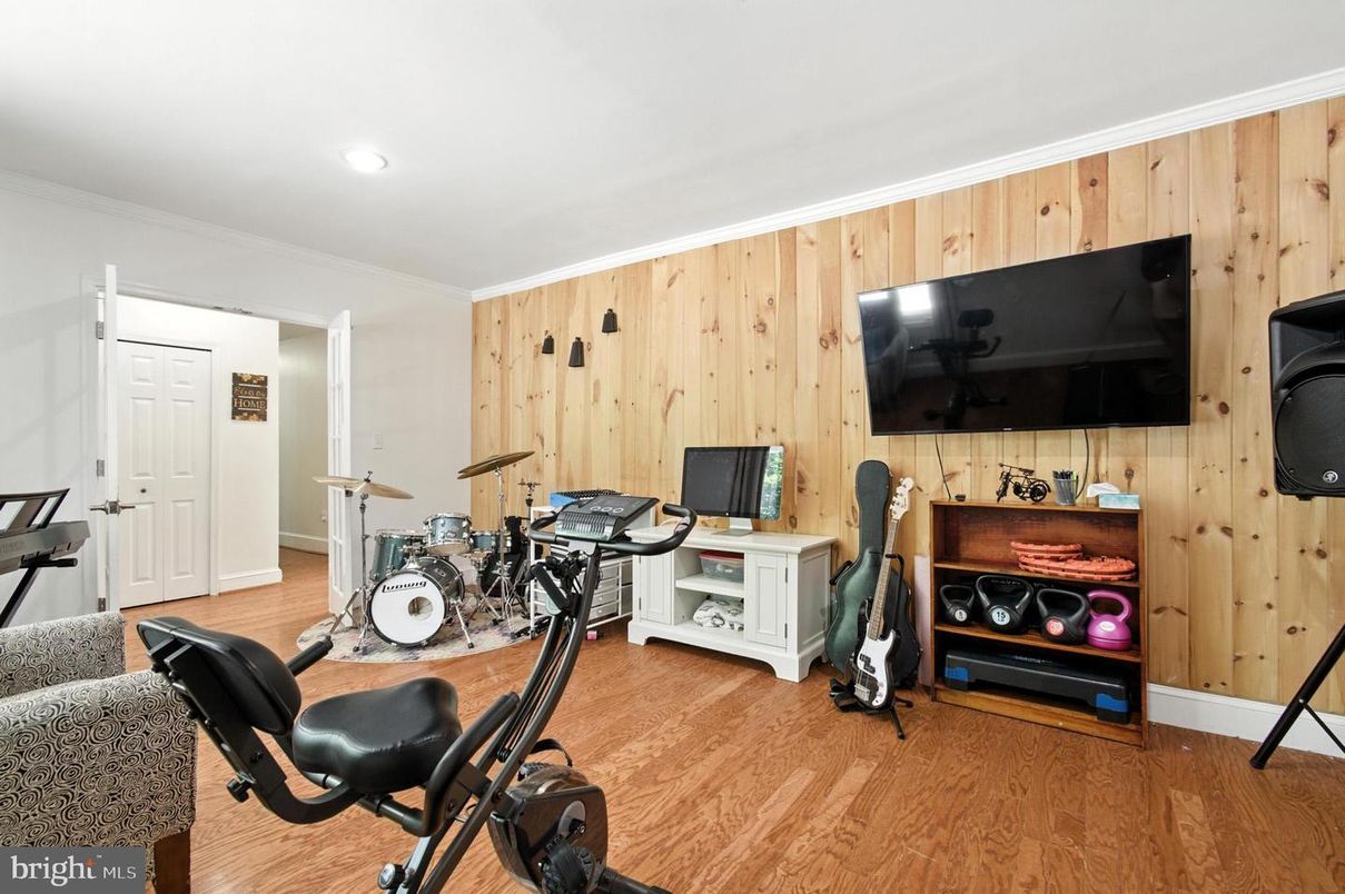 Fitness Equipment, Home Office, Interior, Recessed Lighting, Wood Texture Flooring, Wooden Walls