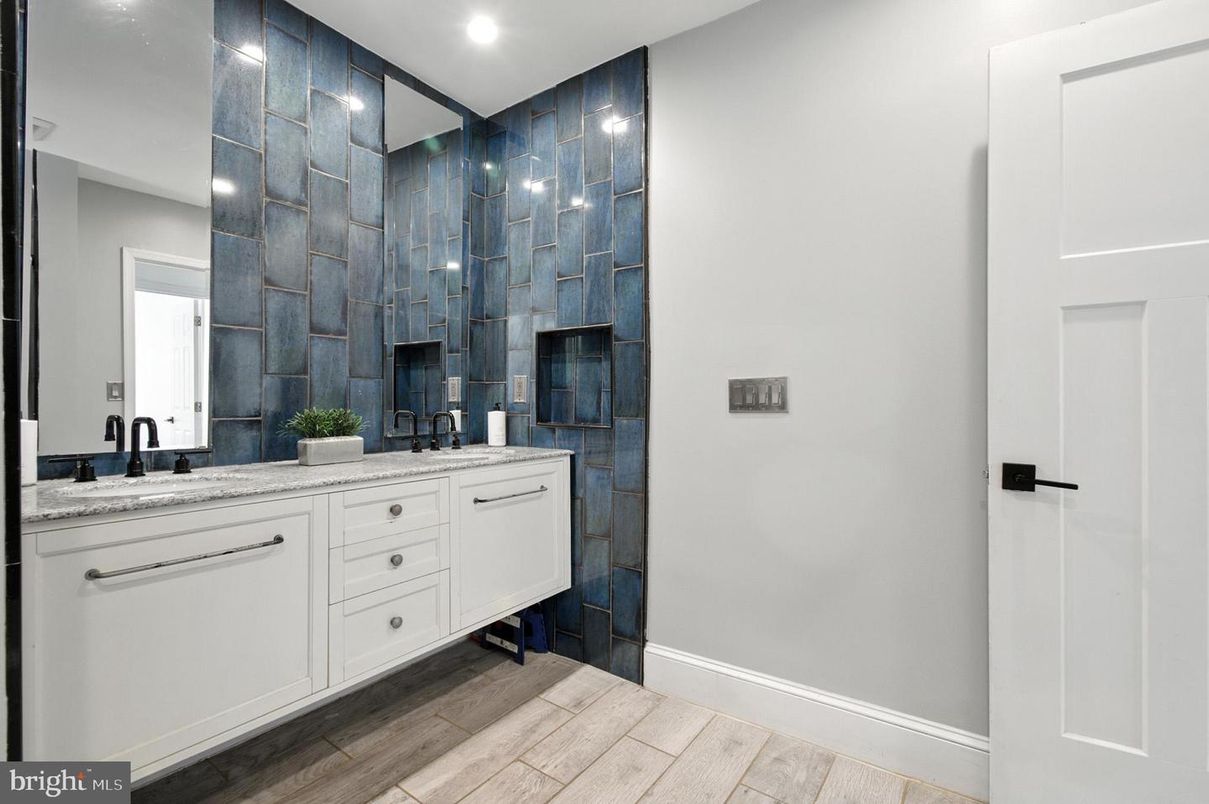 Bathroom, Dual Sink Vanities, Glass Shower, Interior, Recessed Lighting, Wood Texture Flooring