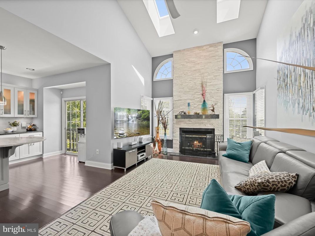 Fireplace, Interior, Living room, Pendant Lights, Recessed Lighting, Stone Walls, Wood Texture Flooring