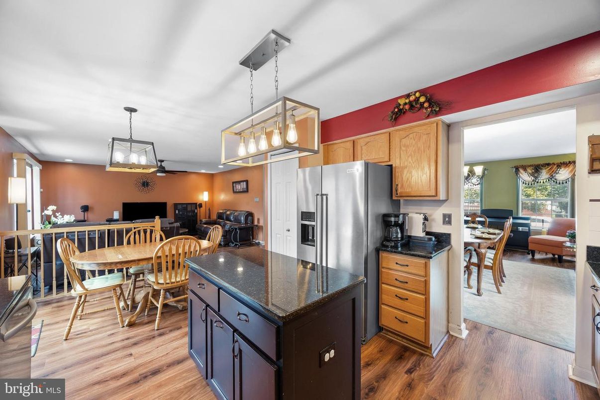 Dining room, Interior, Kitchen, Pendant Lights, Recessed Lighting, Stainless Steel Appliances, Wood Texture Flooring