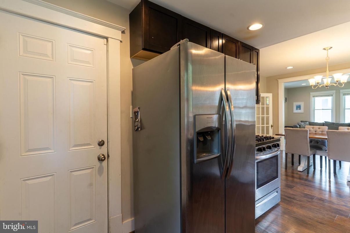 Chandelier, Dining room, Interior, Kitchen, Recessed Lighting, Stainless Steel Appliances, Wood Texture Flooring