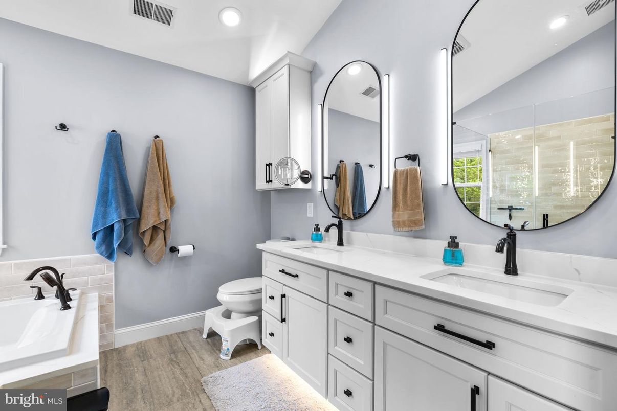 Bathroom, Dual Sink Vanities, Interior, Recessed Lighting, Wood Texture Flooring